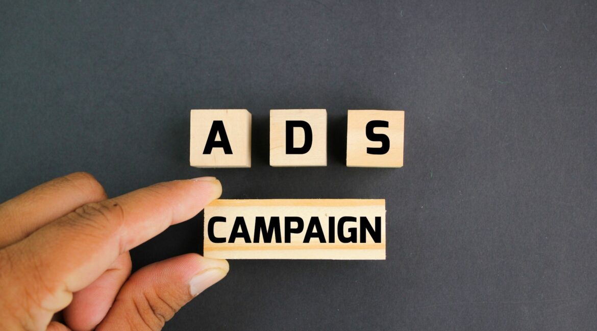 wooden block with the word ADS campaign.